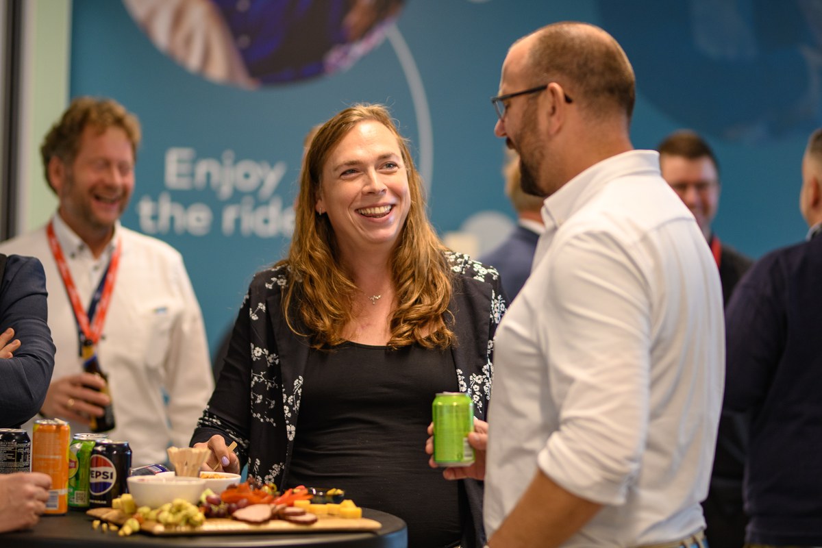 Guests share conversation over refreshments.